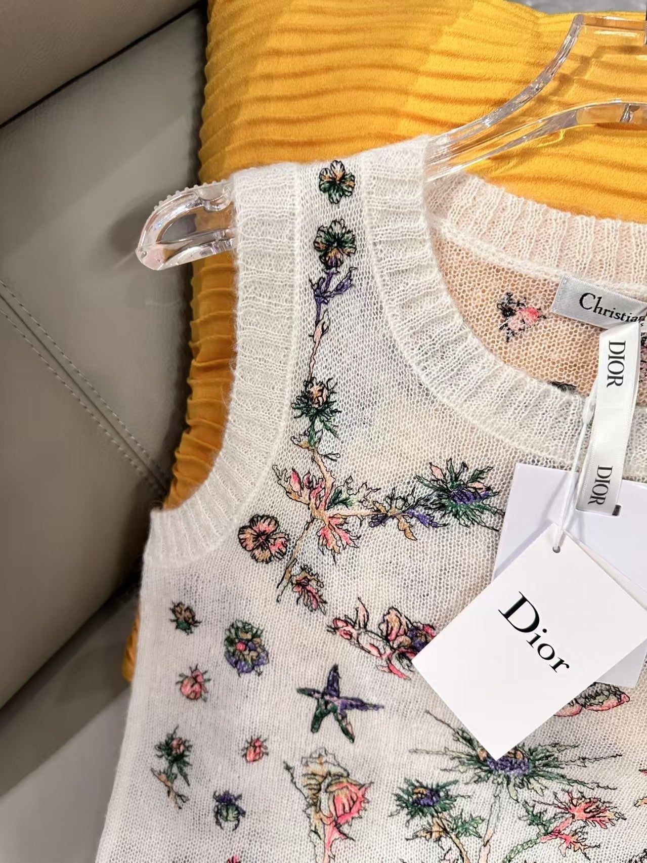 DIO Knitted crew neck sleeveless vest with botanical floral embroidery pattern