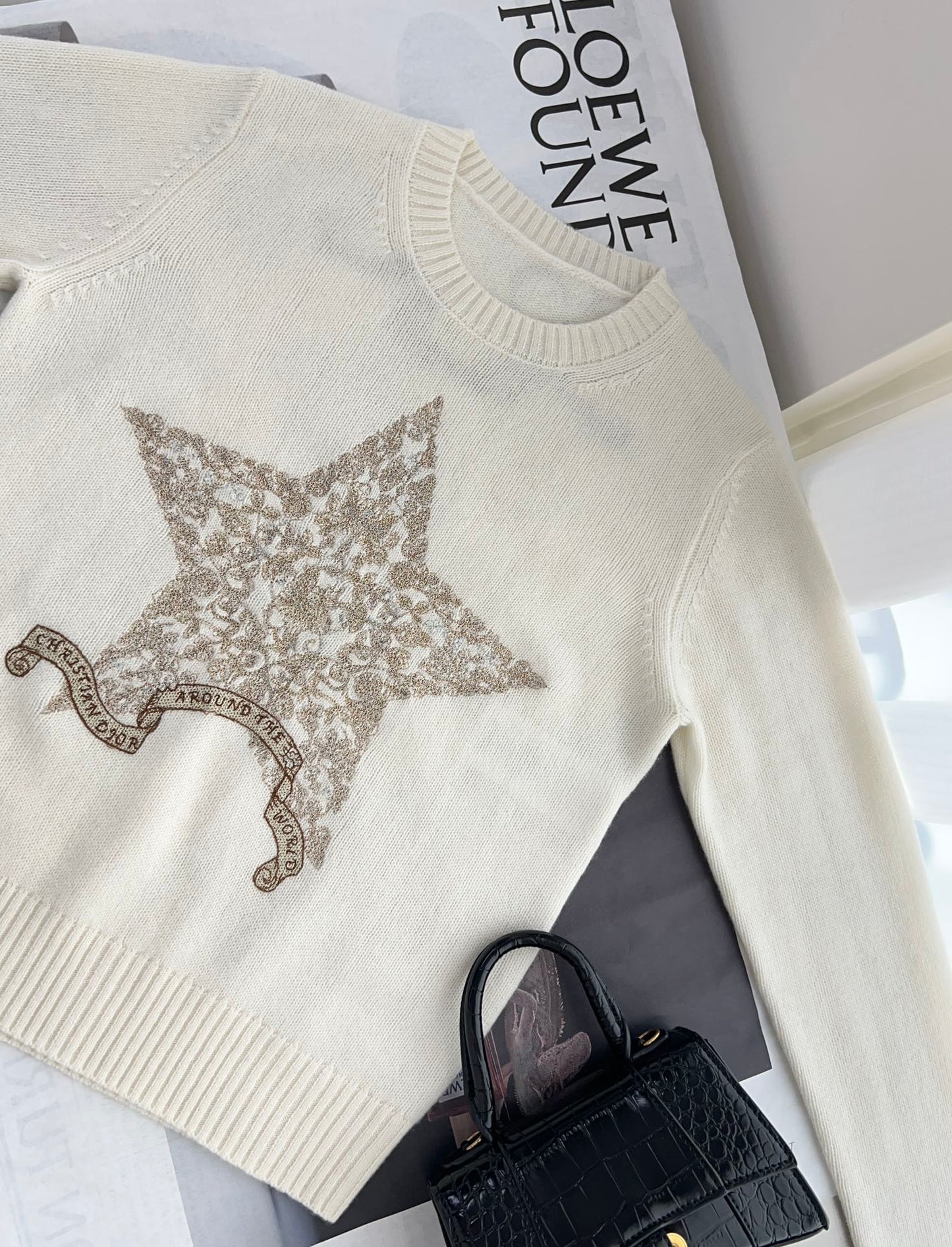 Cashmere sweater with lucky star embroidery