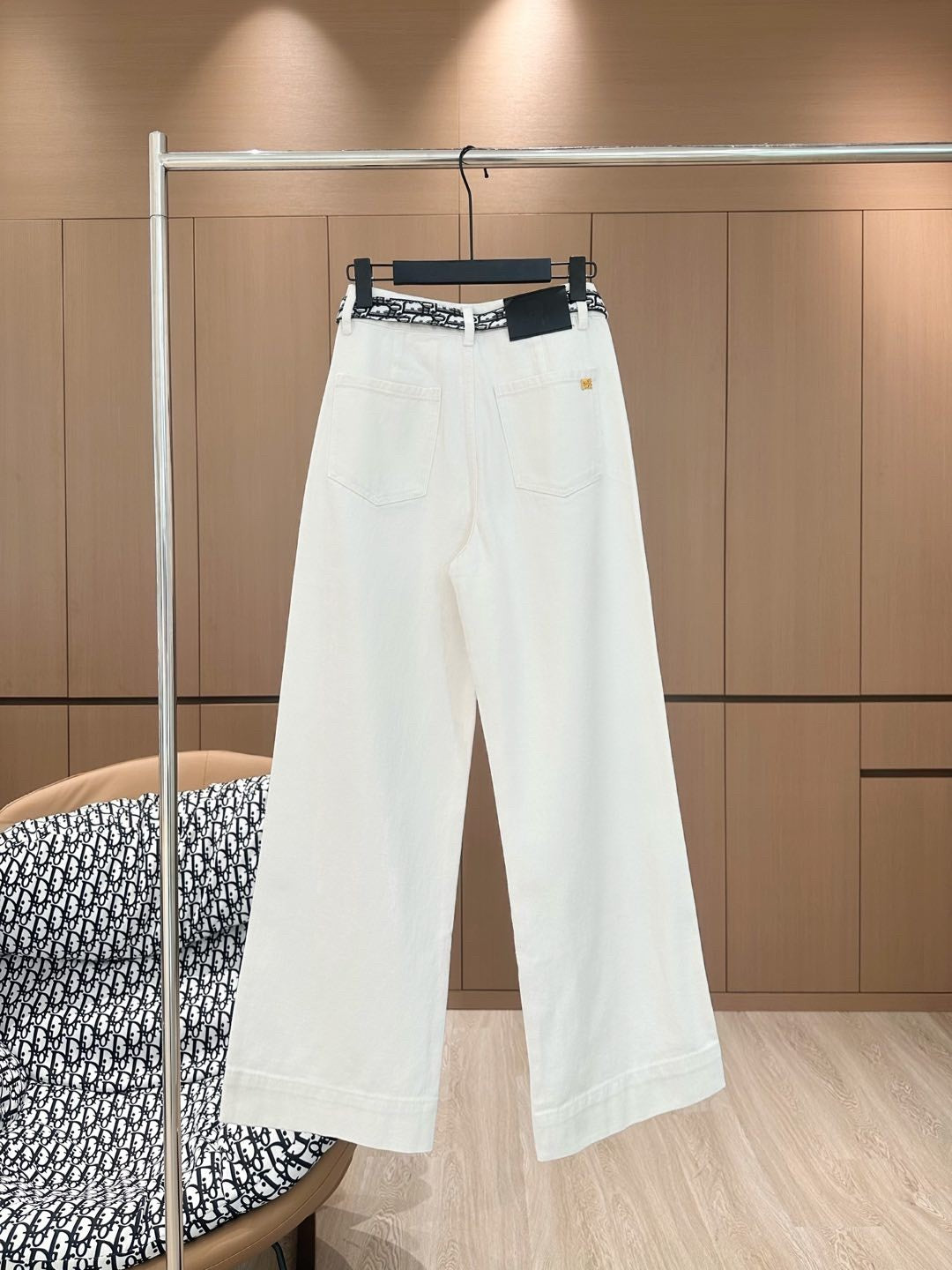 White jeans with logo on waist